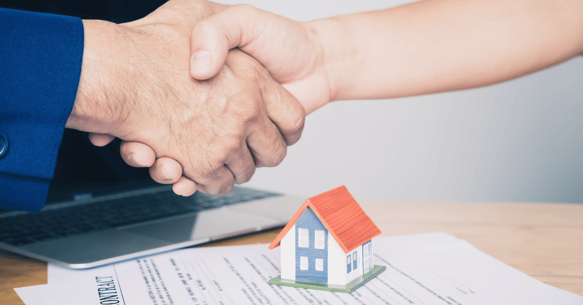 Serrage main signature contrat immobilier 